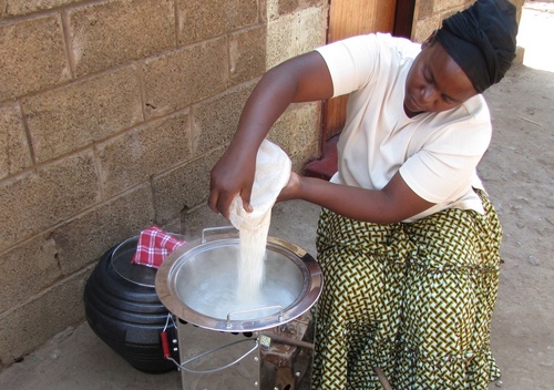 C:\Users\hannah\Desktop\In Focus Images\Zambia cook stove woman cooking_IN Focus..jpg